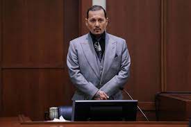 Depp taking the stand for the first day of his testimony on April 19.