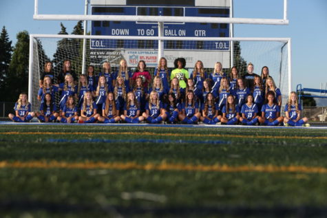 Team Picture of the Soccer Girls on Football Field/ Soccer Girls Playing Game against Westlake HS