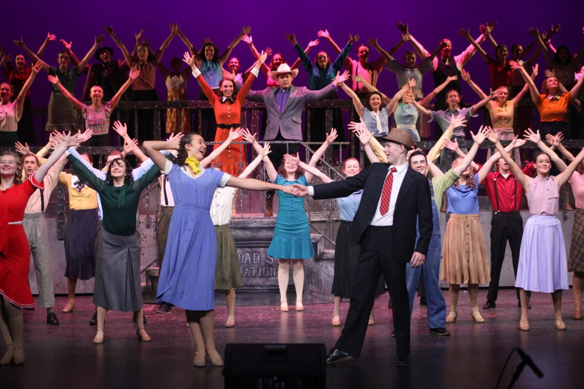 Kaden+Taufer+as+Julian+Marsh+and+Chelsea+Hansen+as+Peggy+Sawyer+in+the+spirited+musical+number%2C+Lullaby+of+Broadway%2C+featuring+the+entire+cast.